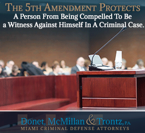 Picture of a Court With An Empty Witness Stand. Ask a Miami Criminal Defense Attorney Before Deciding To Testify