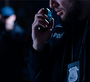 Picture of a Police Officer Having Possible Law-Breaking Conduct. In Case of Trouble with Internal Affairs Contact an Experienced Miami Criminal Defense Attorney