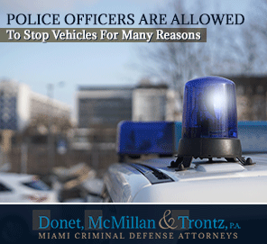Police Officers in miami are Allowed to Stop Vehicles for Many Reasons, Like Suspected Drug Crimes Picture of a Police Pulling Over a Car for Suspected Drug Crime Charges in Miami