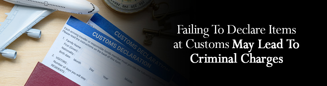 Customs Declaration Form Next to a Plane Figurine To Show the Importance of Avoiding Customs Violations