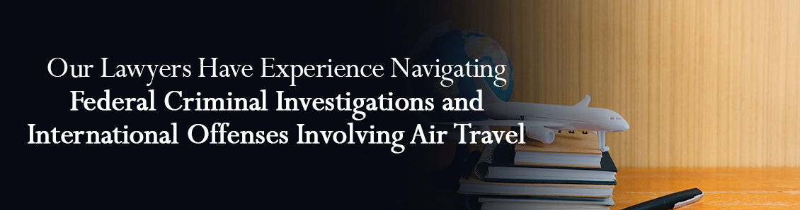 Airplane Figurine on Top of Law Books To Represent International Offenses