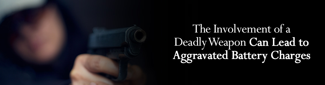 Person Holding a Gun with Both Hands in a Case of Aggravated Battery