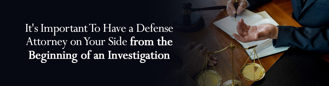 Defense Attorney Working on a Military Investigation on a Desk With the Scales of Justice on the Side
