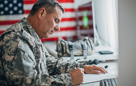 Military Soldier Taking Notes During a Formal Investigation Under the UCMJ