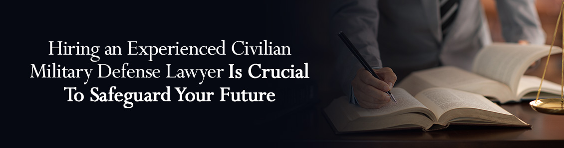 Civilian Military Defense Lawyer Taking Notes While Checking Law Books