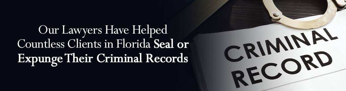 Criminal Record Next to Handcuffs To Represent the Weight of Sealing and Expungement