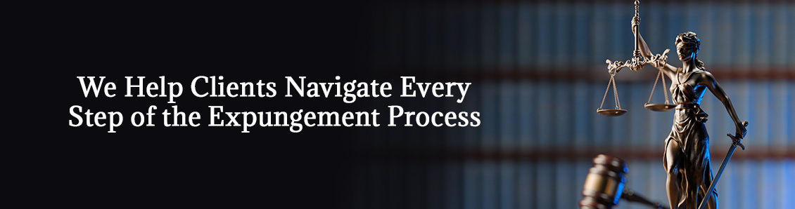 Scales of Justice in Front of Rows or Law Books on Sealing and Expungement