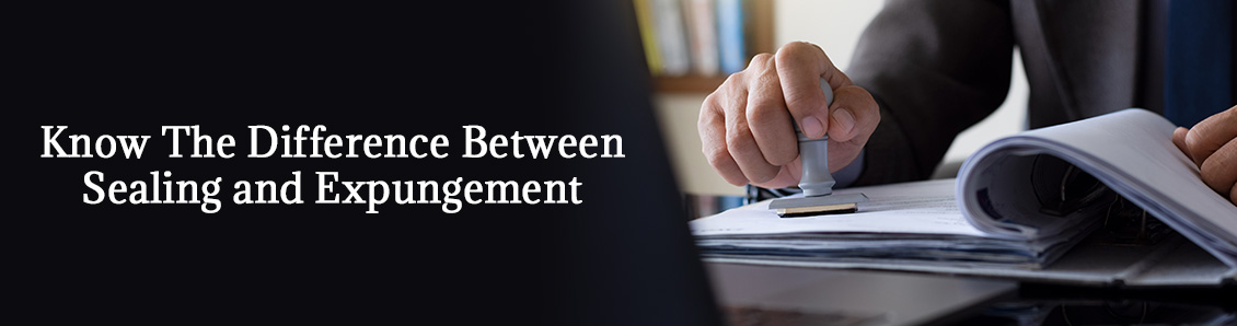 Lawyer Placing Seal on Criminal Record Simbolizing the Difference Between Sealing and Expungement