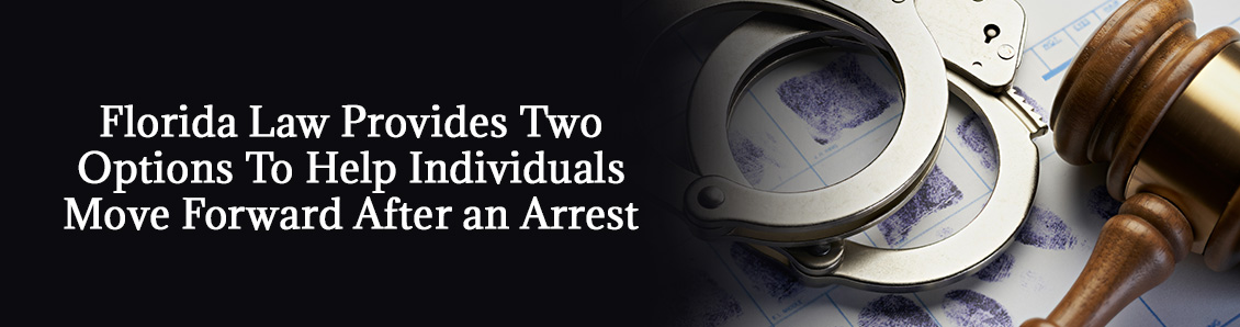 Handcuffs and Gavel on Top of Criminal Record To Represent a Defendant's Options After an Arrest