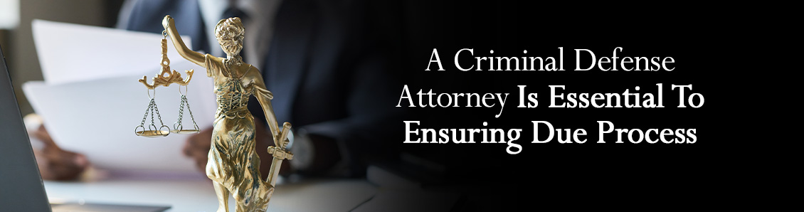 Scales of Justice in Front of Criminal Defense Attorney Reviewing Extradition Documents