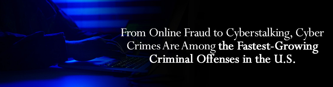 Person Comitting Cyber Crimes on a Laptop With U.S. Flag in the Background