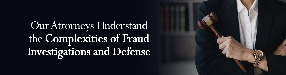 Criminal Defense Lawyer Holding Judge Gavel During Fraud Case