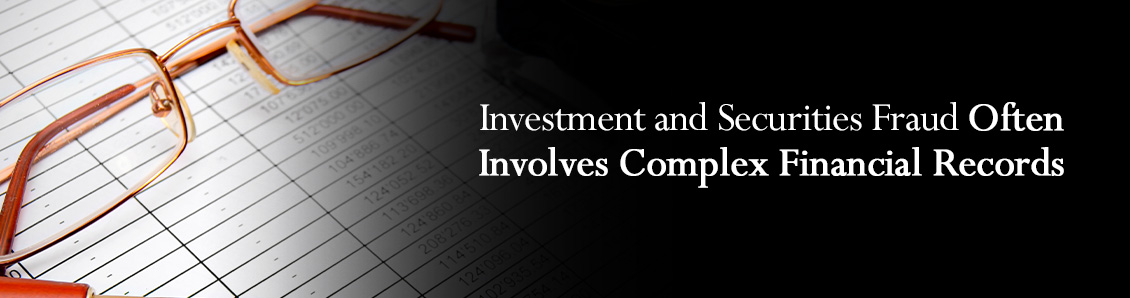 Pair of Glasses on Top of Financial Records To Symbolize Investment Fraud