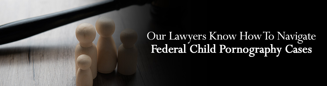 Judge Gavel Next to Children Figurines To Represent the Severity of a Child Pornography Charge