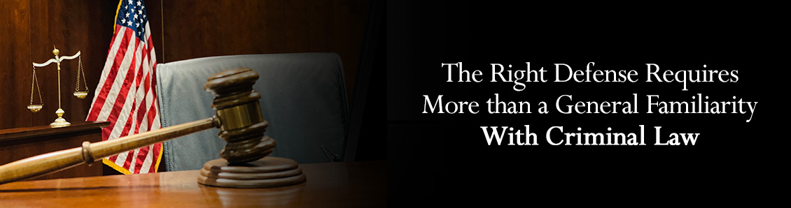 Judge Gavel, Scales of Justice and U.S. Flag on Top of a Desk at Court