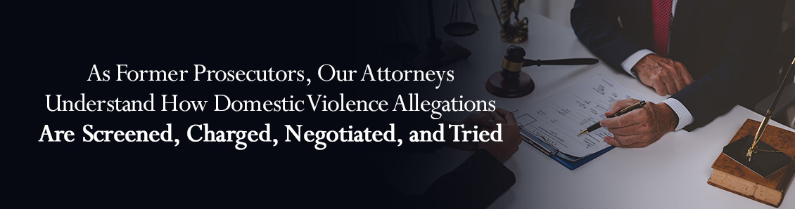 Legal Team Evaluating Documents Before Trial During a Domestic Violence Case