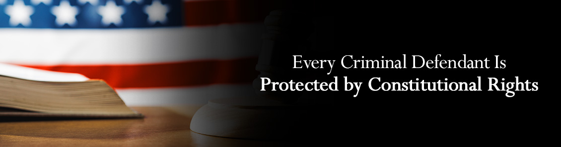 Constitution Book Open Behind the U.S. Flag To Represent Constitutional Rights During a Court Process