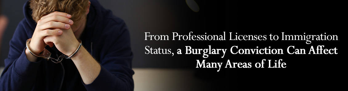 Defendant in Handcuffs Stressing Over the Potential Repercussions of a Burglary Conviction
