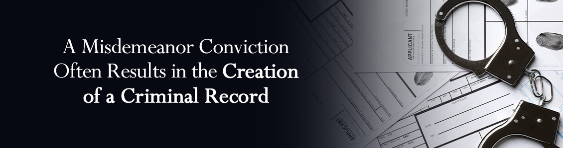 Handcuffs on Top of Criminal Records To Show the Consequences of a Misdemeanor Conviction