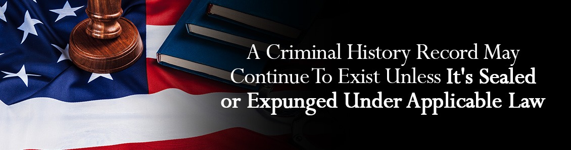 Law Book and Judge Gavel On Top of U.S. Flag Representing the Laws Around Criminal Records