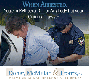 Picture of a Man being Arrested and Refusing to Talk to Anybody But His Doral Criminal lawyers